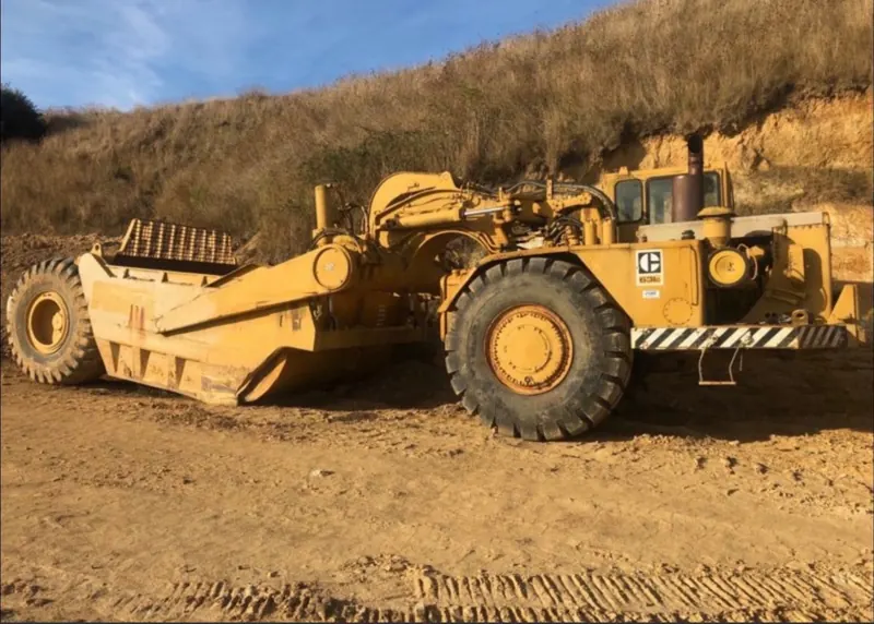 A Caterpillar 631C motor scraper in a clay cut