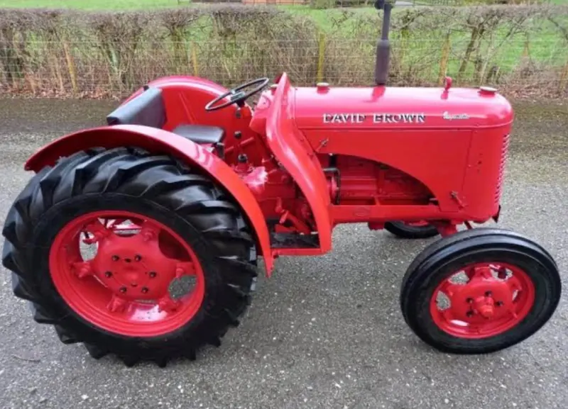 A restored bright red David Brown VAK1C on gravel