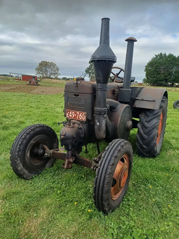 A dark 1938 Lanz Bulldog N single cylinder tractor on grass