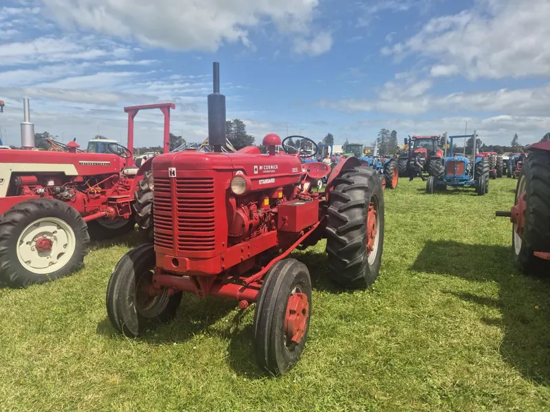 A red McCormick International Super WD6 at a tractor rally