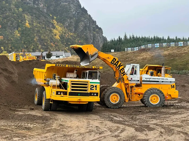 Classic Baker Construction haulers and loaders in action.