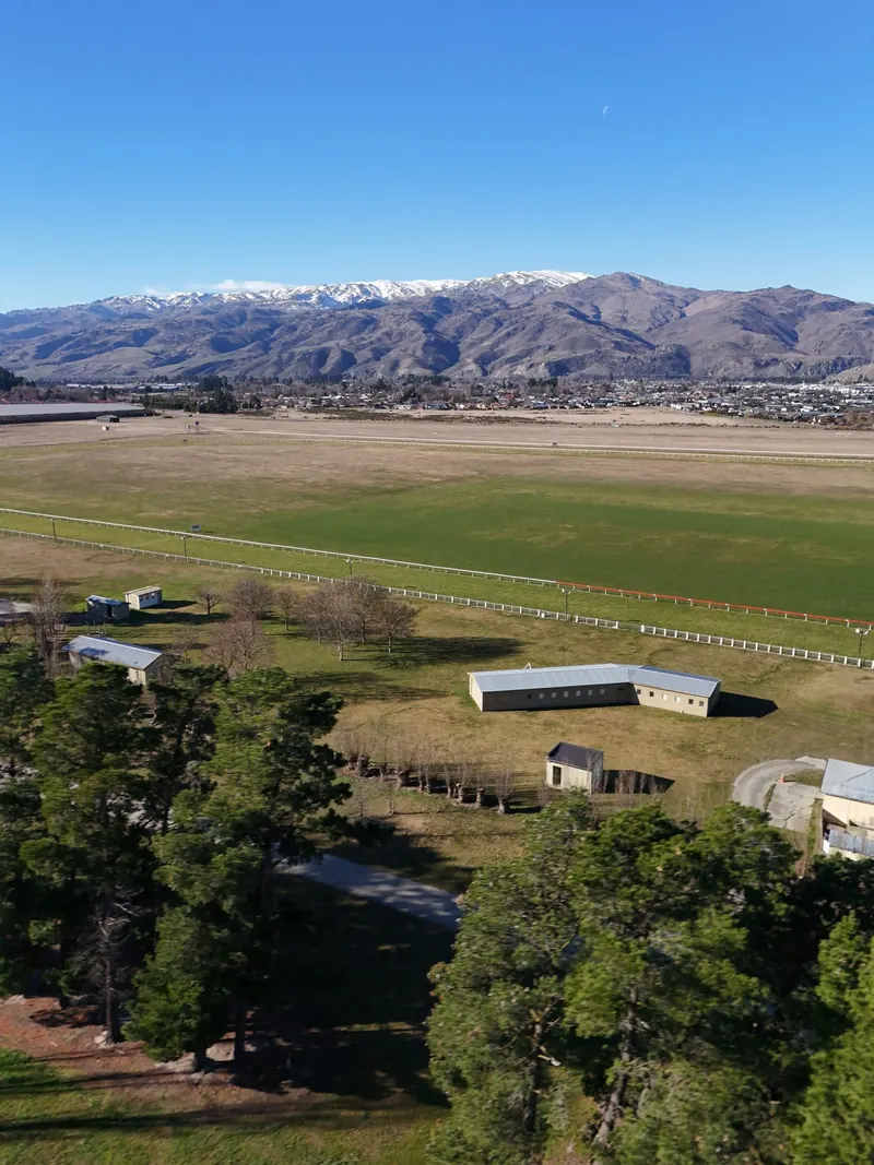 Cromwell Racecourse with the Pisa Range behind (vertical crop).
